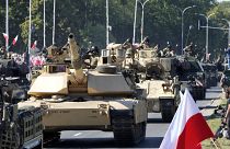 U.S.-made Abrams tanks purchased by Poland take part in a massive military parade to celebrate the Polish Army Day,