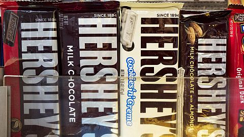In this Friday, Oct. 7, 2016, photo, Hershey's chocolate bars are displayed on a newsstand, in New York.