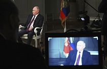 Russian President Vladimir Putin attends an interview with former Fox News host Tucker Carlson at the Kremlin in Moscow, Russia, Tuesday, Feb. 6, 2024.