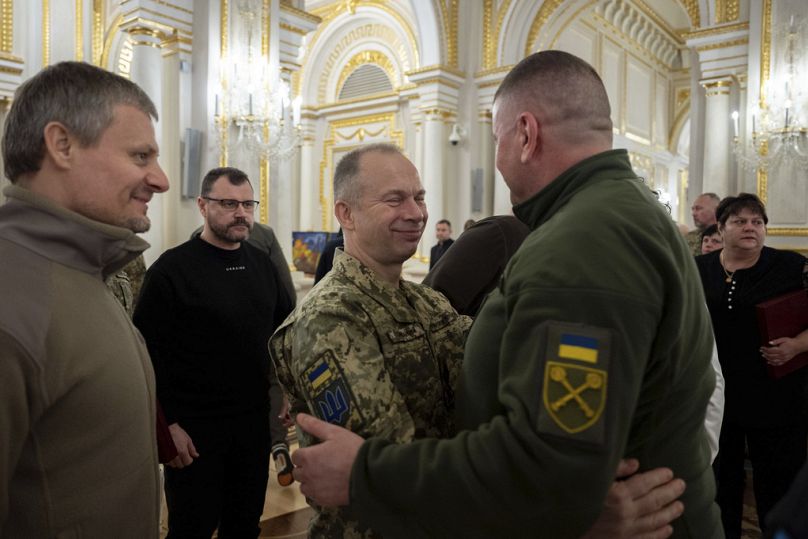 Former Commander-in-Chief of Ukraine's Armed Forces Valerii Zaluzhnyi, right, and newly appointed Commander-in-Chief of Ukraine's Armed Forces Oleksandr Syrsky