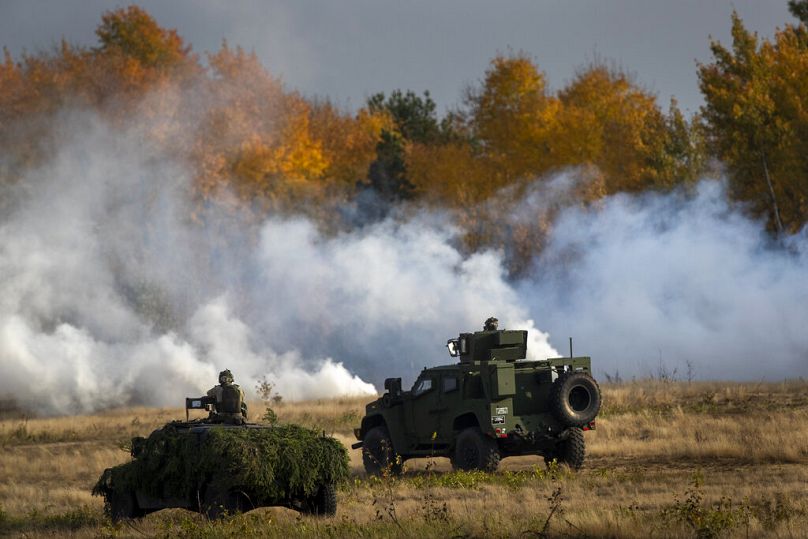A NATO exercise in the west of the capital Vilnius, Lithuania, Saturday, Oct. 8, 2022.