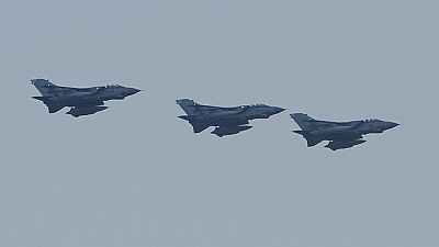 FILE - Tornados surveillance aircrafts come in to land at the British Royal Air Force Base at Akrotiri, near the southern port city of Limassol, Cyprus, on Wednesday, Aug. 13,