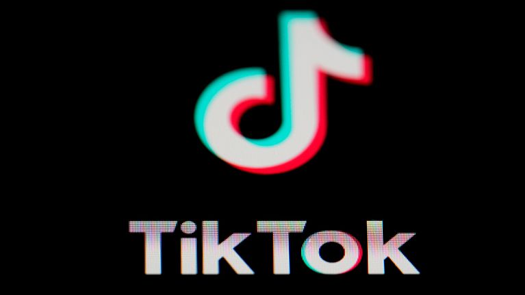 The icon for the video sharing TikTok app is seen on a smartphone.