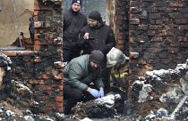 Эксперты на месте сгоревшего дома в Харькове