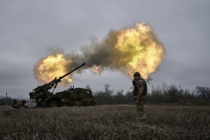 FILE - Ukrainian soldiers fire a French-made CAESAR self-propelled howitzer towards Russian positions near Avdiivka, Donetsk region, Ukraine, Monday, Dec. 26, 2022.