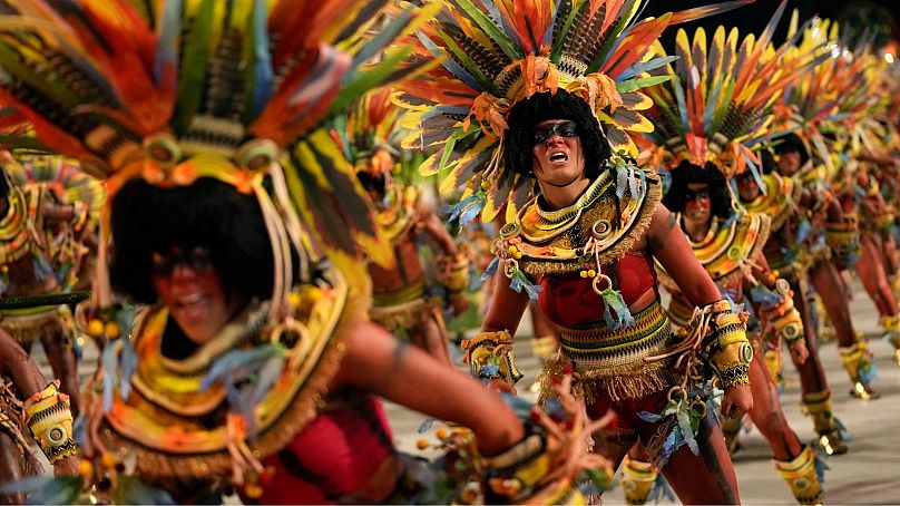 Performers from the Salgueiro samba school parade during Carnival celebrations at the Sambadrome in Rio de Janeiro, Brazil, 12 February 2024.
