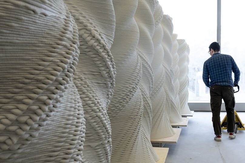 Each column has its own unique surface pattern and ornaments, an example of the power of 3D printing to transform building.
