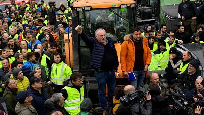 Farmers with their tractors attend a protest in Pamplona, northern Spain, Friday, Feb. 9, 2024.