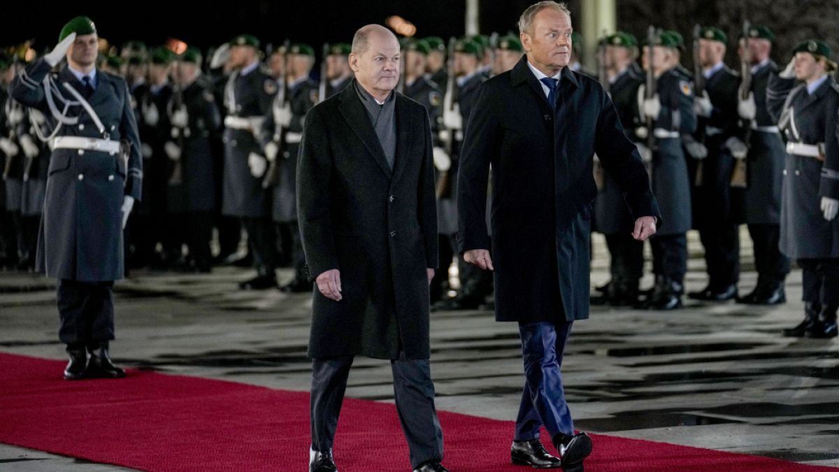German Chancellor Olaf Scholz, left, welcomes Poland's Prime Minister Donald Tusk with military donors in Berlin, Germany, Monday, Feb.12, 2024.