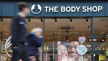 People walk past a Body Shop store in Canterbury, England, Tuesday, Feb. 13, 2024.