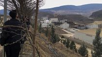 Journalists work next to the Copler gold mine near Ilic village, east Turkey, Tuesday, Feb. 13, 2024. 