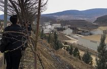 Journalists work next to the Copler gold mine near Ilic village, east Turkey, Tuesday, Feb. 13, 2024. 