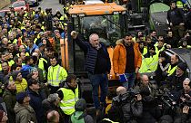 Farmers with their tractors attend a protest in Pamplona, northern Spain, Friday, Feb. 9, 2024. For fourth non stop days, farmers in Spain have staged tractor protests across 
