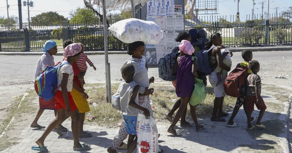 Families continue to flee capital as new bout of gang violence grips Haiti