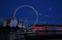 The London Eye lit up in the colors of the Ukraine to mark their Independence Day in London, Wednesday, Aug. 24, 2022. 