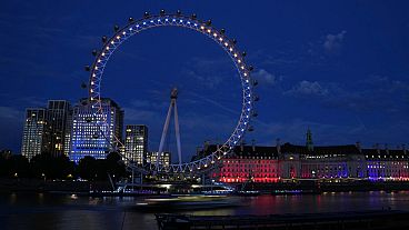The London Eye lit up in the colors of the Ukraine to mark their Independence Day in London, Wednesday, Aug. 24, 2022. 