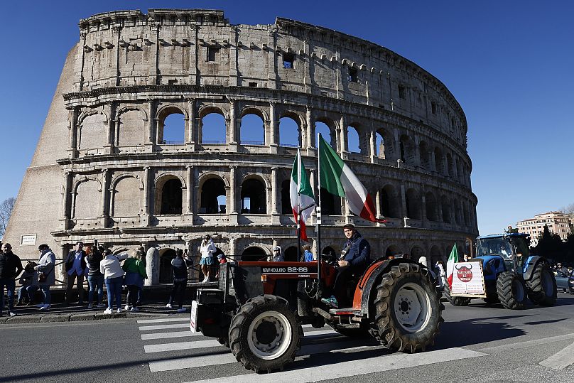 Tractors pass in front of the Coliseum as farmers protest continues in Rome, Italy.