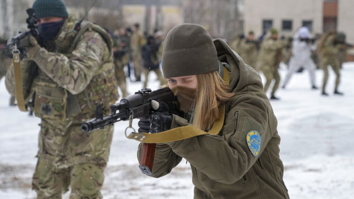Women in Ukraine prepare for combat in military training sessions thumbnail