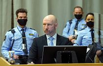 Convicted mass murderer Anders Behring Breivik sits in the makeshift courtroom in Skien, Norway, Jan. 19, 2022.  