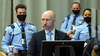 Convicted mass murderer Anders Behring Breivik sits in the makeshift courtroom in Skien, Norway, Jan. 19, 2022.  