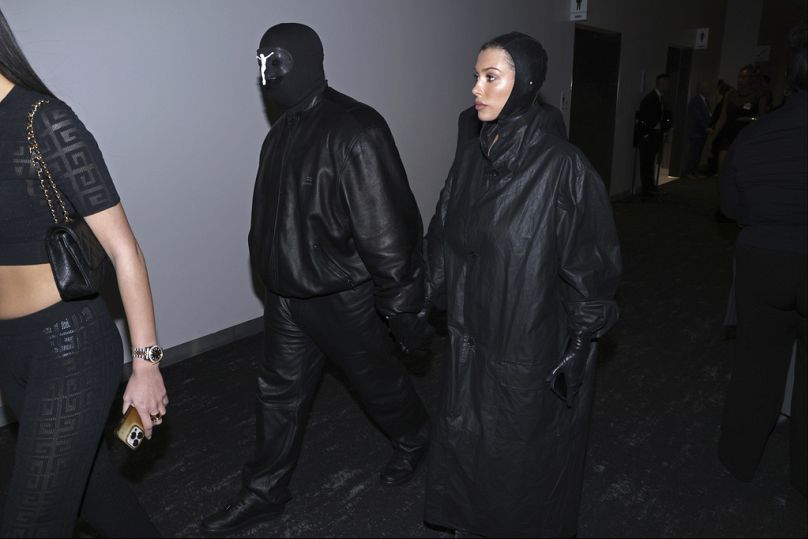 Kanye West, left and, Bianca Censori arrive during the NFL Super Bowl 58 football game Sunday, 11 February 2024, in Las Vegas.