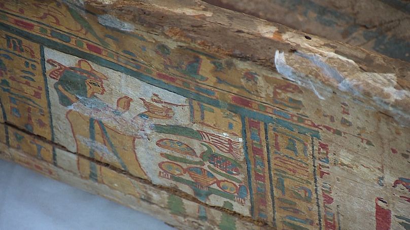Photo shows decorative details on the Egyptian wooden sarcophagus