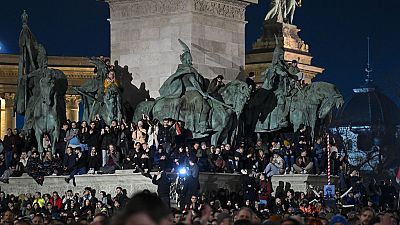 People attend a protest at Heroes' Square in Budapest, Hungary, Friday, Feb 16, 2024