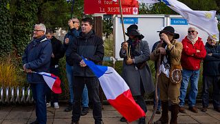 People gather in Saint-Jean-de-Monts, western France on Saturday Nov. 4, 2023, at the call of a far-right group against the reception in the town of 15 migrants.