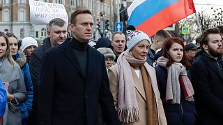 الکسی ناوالنی و همرش یولیا در یک راهپیمایی در مسکو به تاریخ ۲۹ مارس ۲۰۲۰