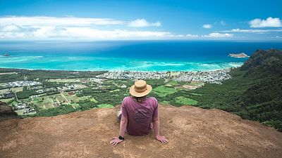 A tourist takes in the natural beauty of the Kuli'ou'ou Ridge Trail in Honolulu