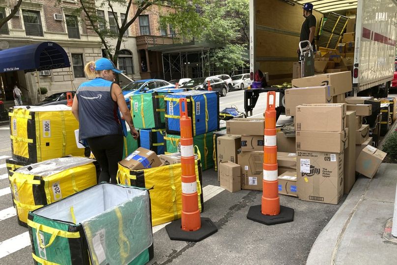 An Amazon truck is unloaded for deliveries on New York's Upper West Side,August 2023