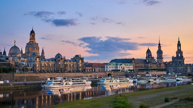 A view of Dresden's historical city centre with steam boats on the Elbe river