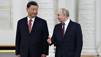 Putin junto a Xi Jinping.
