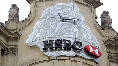 he logo of British bank HSBC is visible on the facade of HSBC France headquarters on the Champs Elysees in Paris, Monday Feb. 9, 2015.