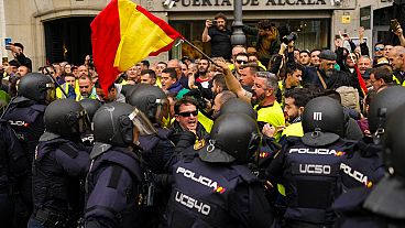 Farmers scuffle with Spanish riot police during a protest in Madrid, Spain, Wednesday, 21 January, 2024.