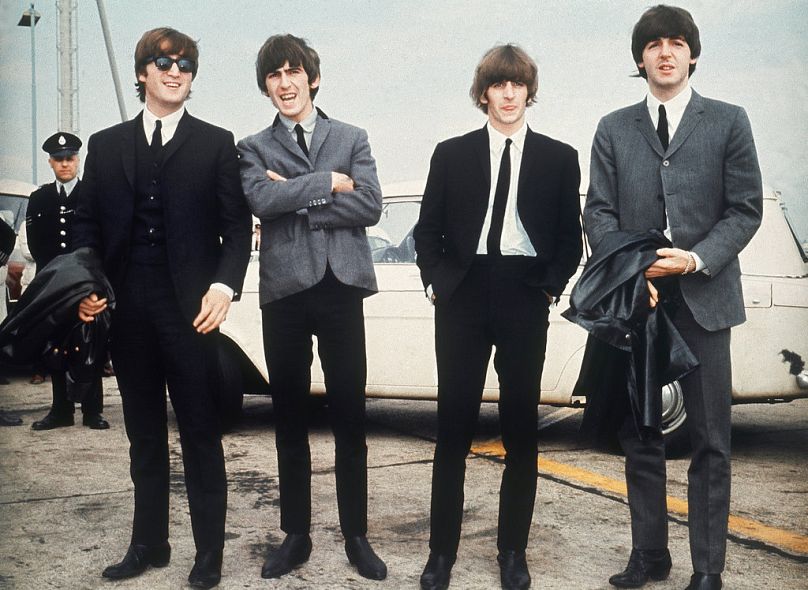 The Beatles arrive at Speke airport, Liverpool on July 10, 1964, for the Liverpool premiere of their movie "A Hard Day's Night."