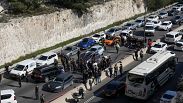 Israeli security forces examine the scene of a shooting attack near the West Bank settlement of Maale Adumim, Thursday, Feb. 22, 2024. 