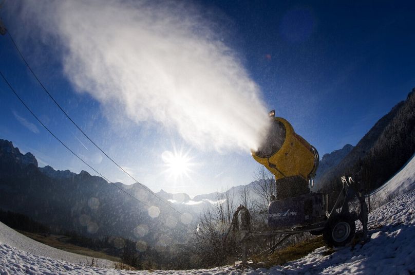 A snow cannon in action in the Austrian province of Salzburg, pictured in this file photo