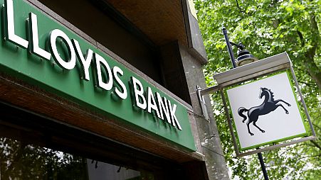 In this Friday, June 5, 2015 file photo, a sign for the Lloyds Bank is seen at a branch in London.