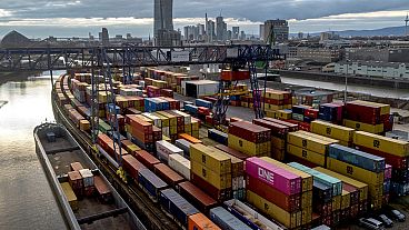 Containers are pictured in the small harbour in Frankfurt, Germany, Tuesday, Feb. 13, 2024. 