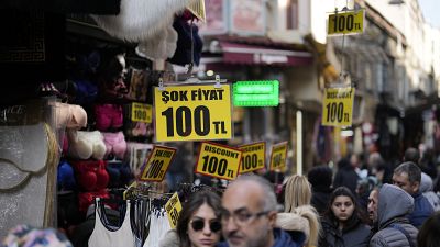 Prices are displayed in a clothes shop at Eminonu commercial area in Istanbul, Turkey, Wednesday, Feb. 21, 2024. 