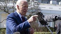  President Joe Biden talks with reporters before boarding Marine One on the South Lawn of the White House, Tuesday, Feb. 20, 2024