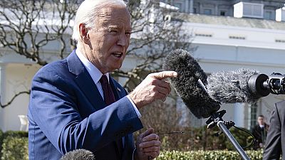  President Joe Biden talks with reporters before boarding Marine One on the South Lawn of the White House, Tuesday, Feb. 20, 2024