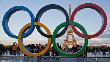 The Olympic rings are set up at Trocadero plaza that overlooks the Eiffel Tower.