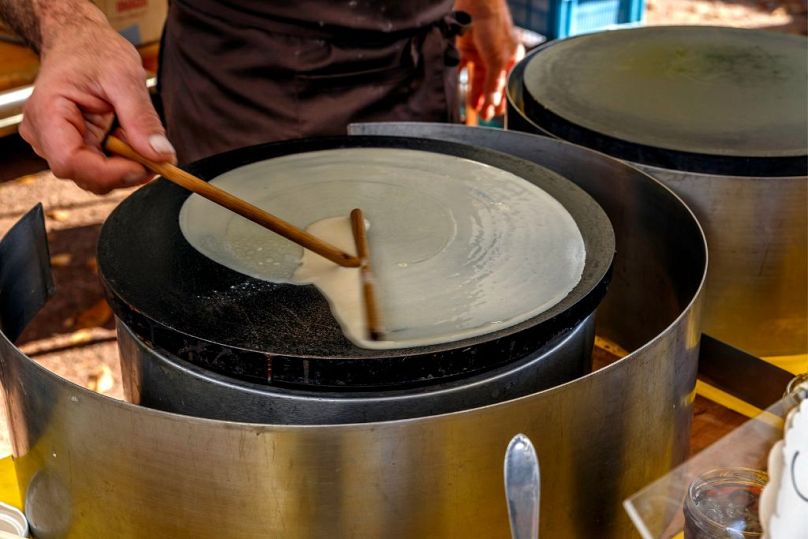 Freshly cooked French crêpes are a low-cost lunch on the go in Paris