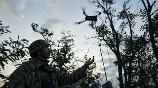 A Ukrainian soldier launches a drone near Bakhmut, the site of fierce battles with the Russian forces in the Donetsk region, September 2023.