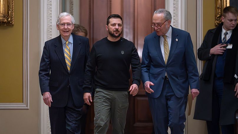 Ukrainian President Volodymyr Zelenskyy, centre, with members of the US Senate as he visited Washington in a plea for wartime funding, December 2023.