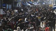 Palestinians crowd a market in Rafah, Gaza Strip, Thursday, Feb. 22, 2024.