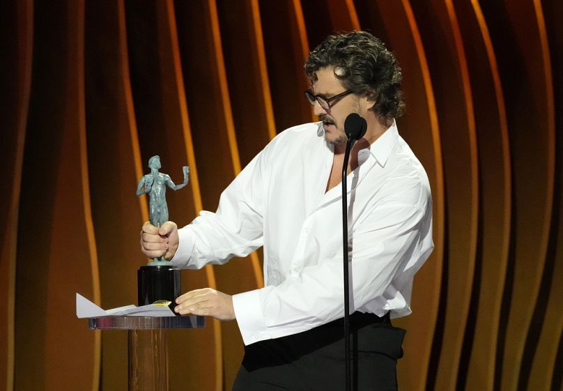 Pedro Pascal accepting his award for best actor in a television drama series at the 30th annual SAG Awards in Los Angeles.
