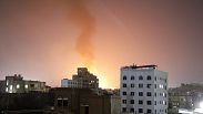 Smoke rises after the U.S.-led airstrikes on hit targets in Sanaa, Yemen, Sunday, Feb. 25, 2024. 
